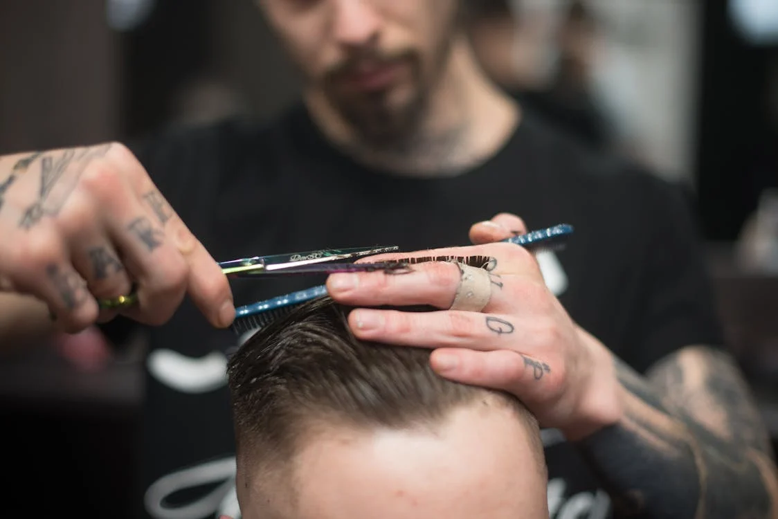 Bangkok grooming guide with barber giving a precision haircut