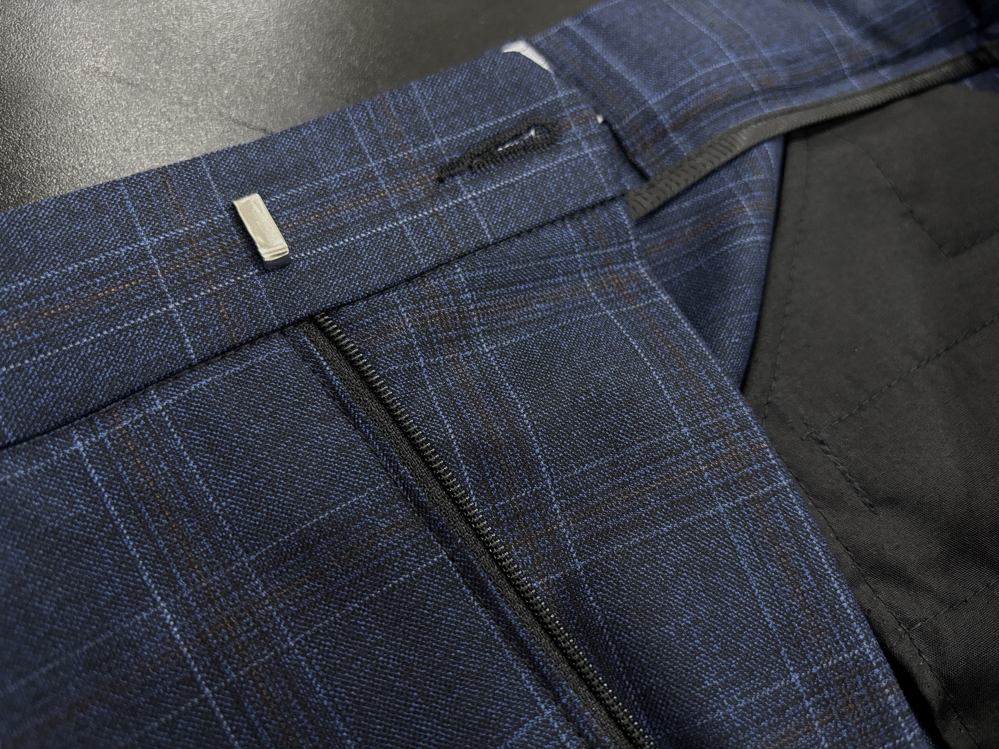 Additional internal waistband fastener